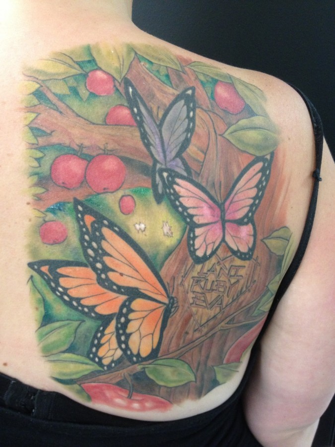 Apple tree and butterfly tattoo