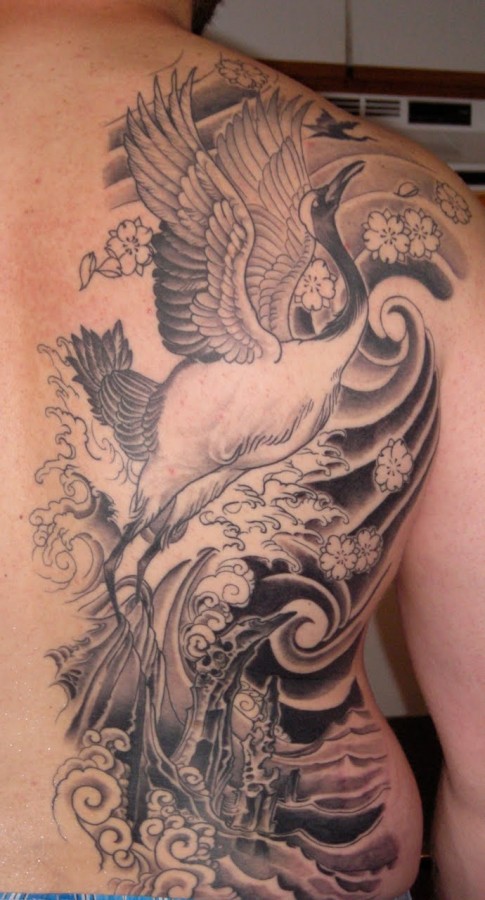 Awesome crane back tattoo