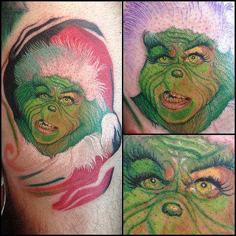 Awesome green grinch christmas tattoo