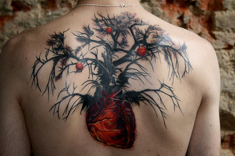 Awesome heart root apple tree tattoo