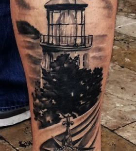 Awesome lighthouse leg tattoo