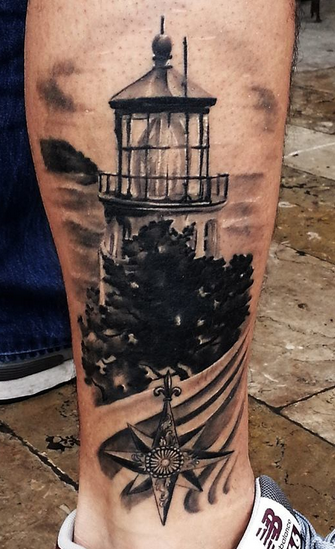 Awesome lighthouse leg tattoo