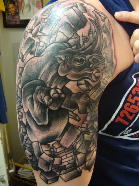 Awesome rhino arm tattoo