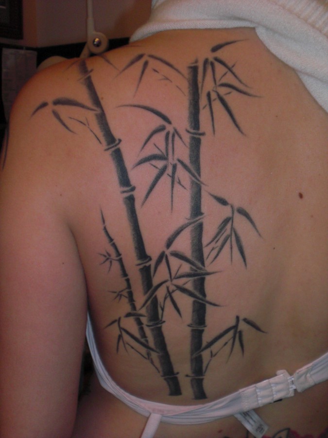 Bamboo tree back tattoo