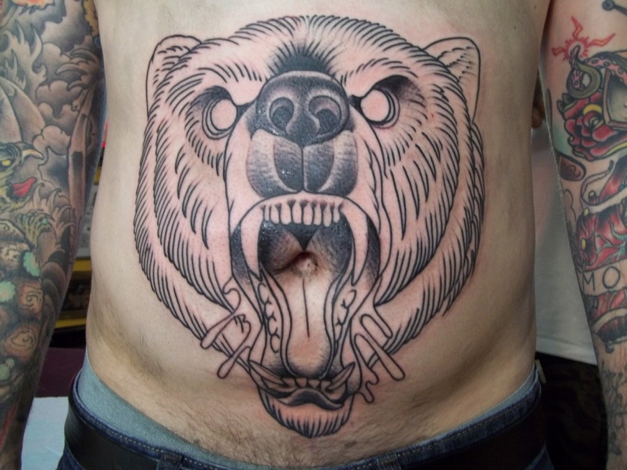 Bears head stomach tattoo