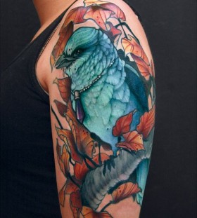 Beautiful blue bird arm tattoo