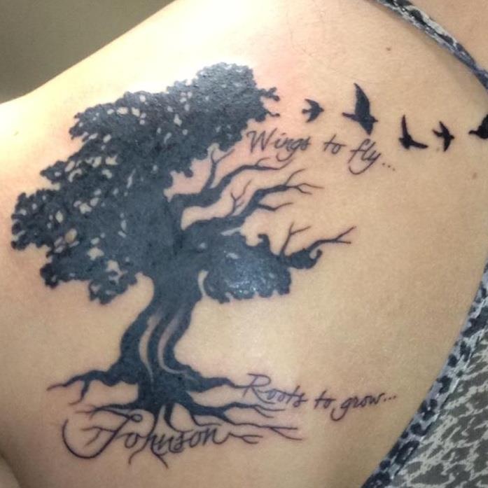 Beautiful oak and birs back tattoo