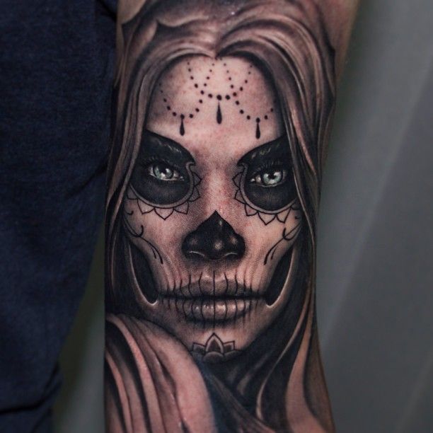 Beautiful sugar skull tattoo by Riccardo Cassese