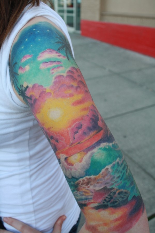 Beautiful sunset arm tattoo