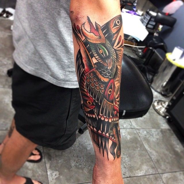 Bird arm tattoo by James McKenna