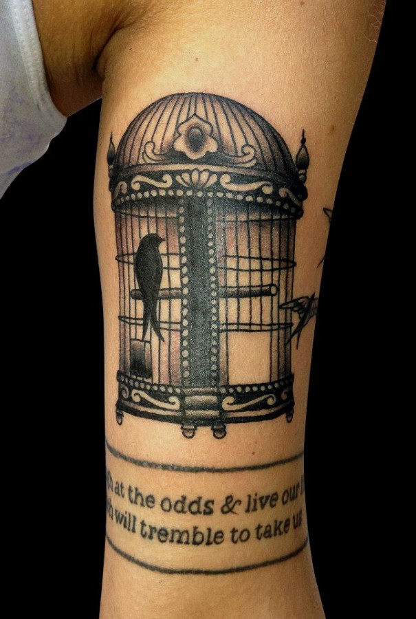 Birdcage and quote tattoo