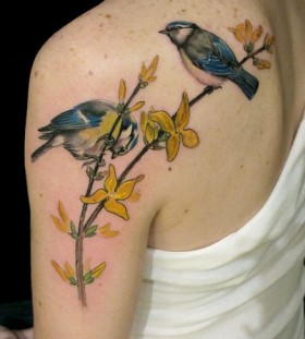 Birds on a branch tattoo by Esther Garcia
