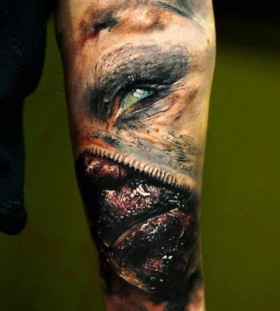 Black and blue scary tattoo