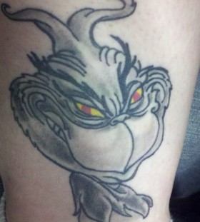 Black and white grinch christmas tattoo