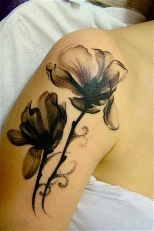 Black flowers watercolor tattoo