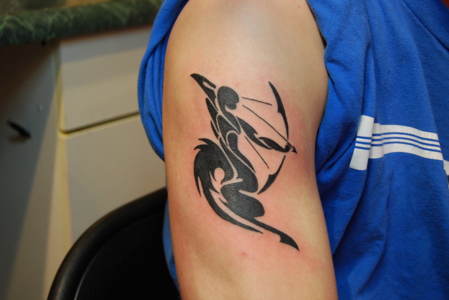 Black ink archer tattoo