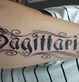 Black ink sagittarius tattoo