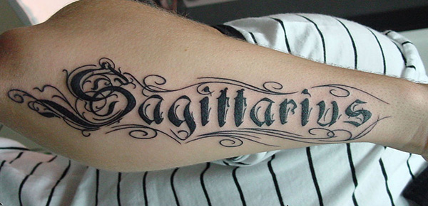 Black ink sagittarius tattoo