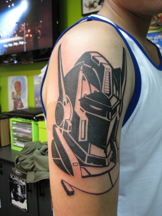 Black ink transformers tattoo