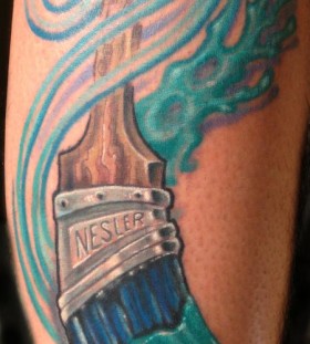 Blue coloured paint brush tattoo