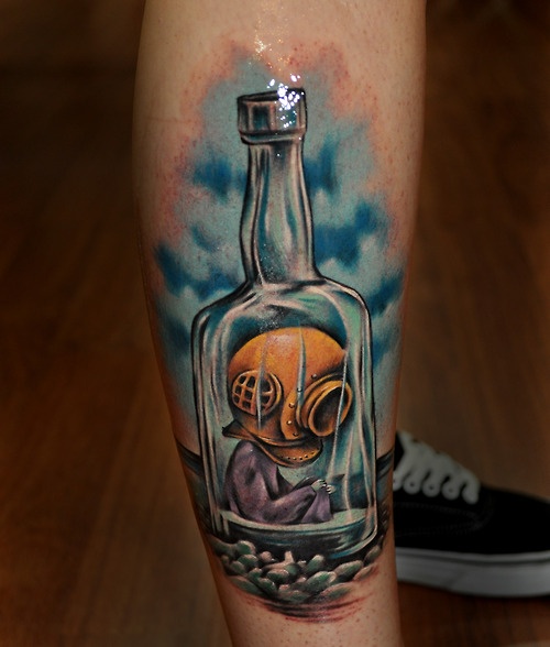 Blue cool looking bottle tattoo