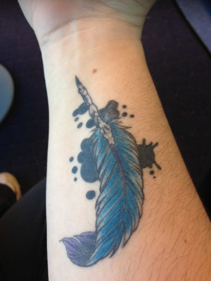 Blue feather pen tattoo