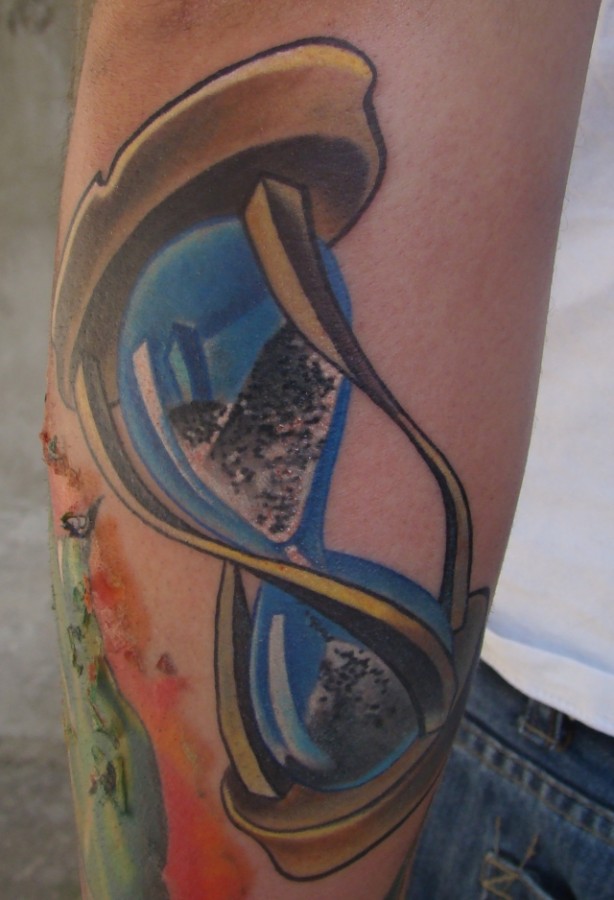 Blue sand clock tattoo