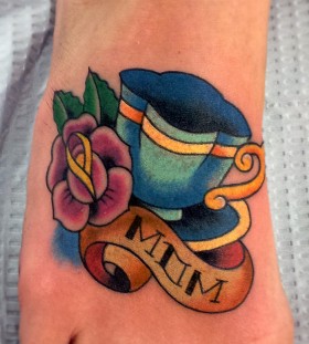 Blue teacup and flower foot tattoo