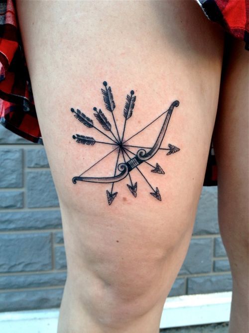 Bow and arrow leg tattoo