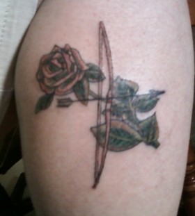 Bow and arrow rose tattoo