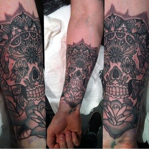 Brilliant skull tattoo by Flo Nuttall