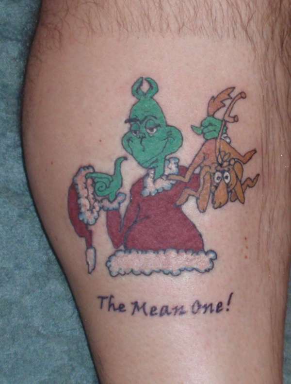 Brown dog grinch christmas tattoo