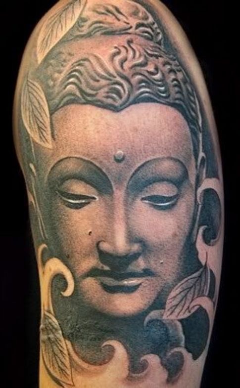 Buddha tattoo on arm