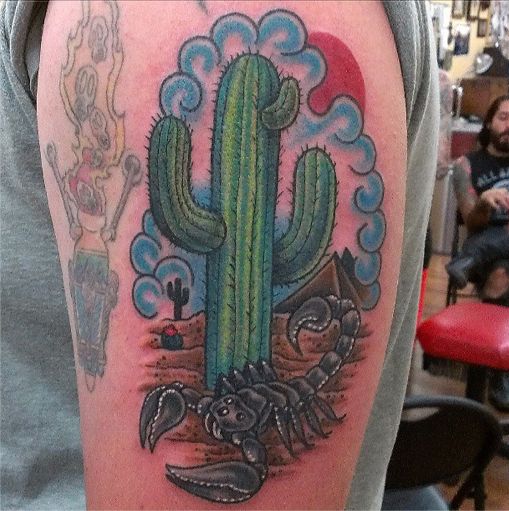 Cactus and scorpion tattoo