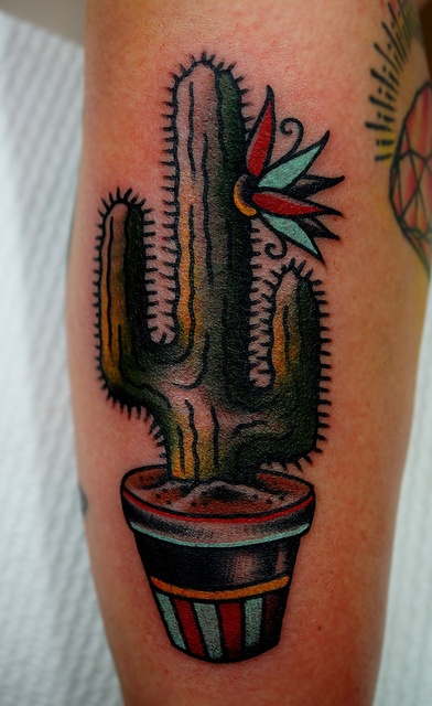 Cactus tattoo by Charley Gerardin