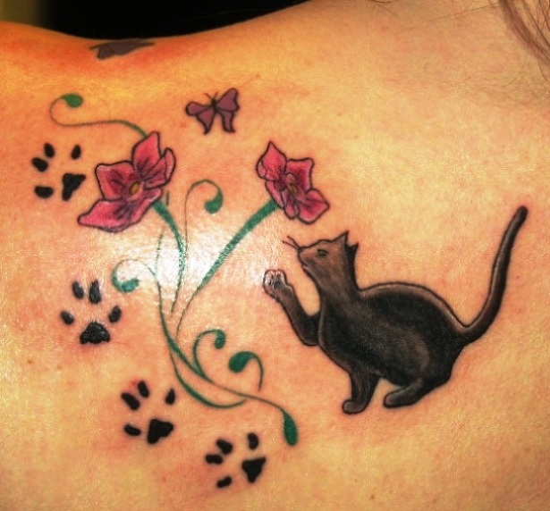 Cat paws and flowers tattoo