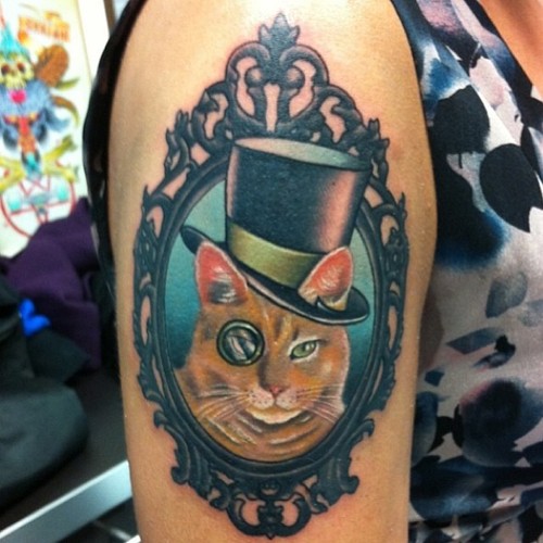 Cat with a hat frame tattoo