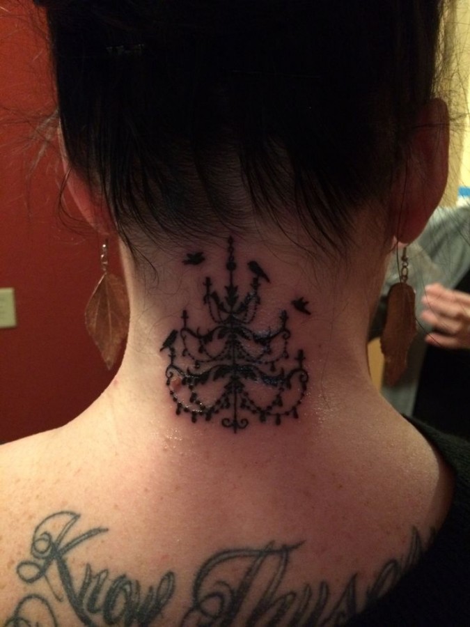 Chandelier tattoo on back of neck