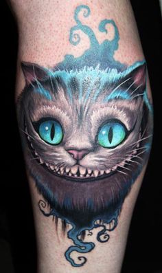 Cheshire cat tattoo by James Tattooart