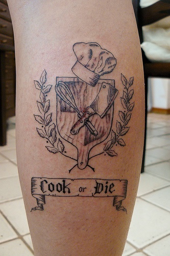 Chief of kitchen style black tattoo