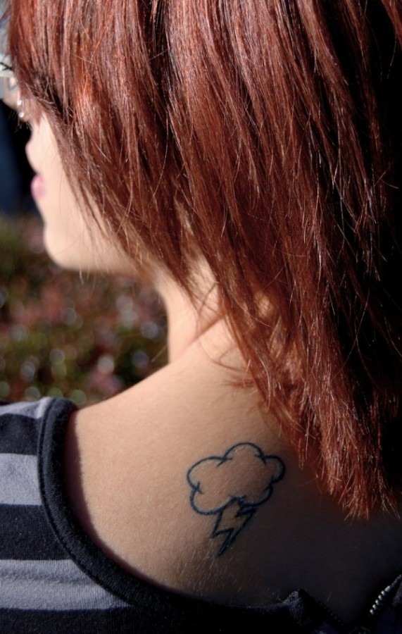 Cloud and lightning bolt tattoo