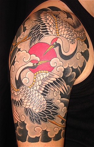 Coloured crane shoulder tattoo