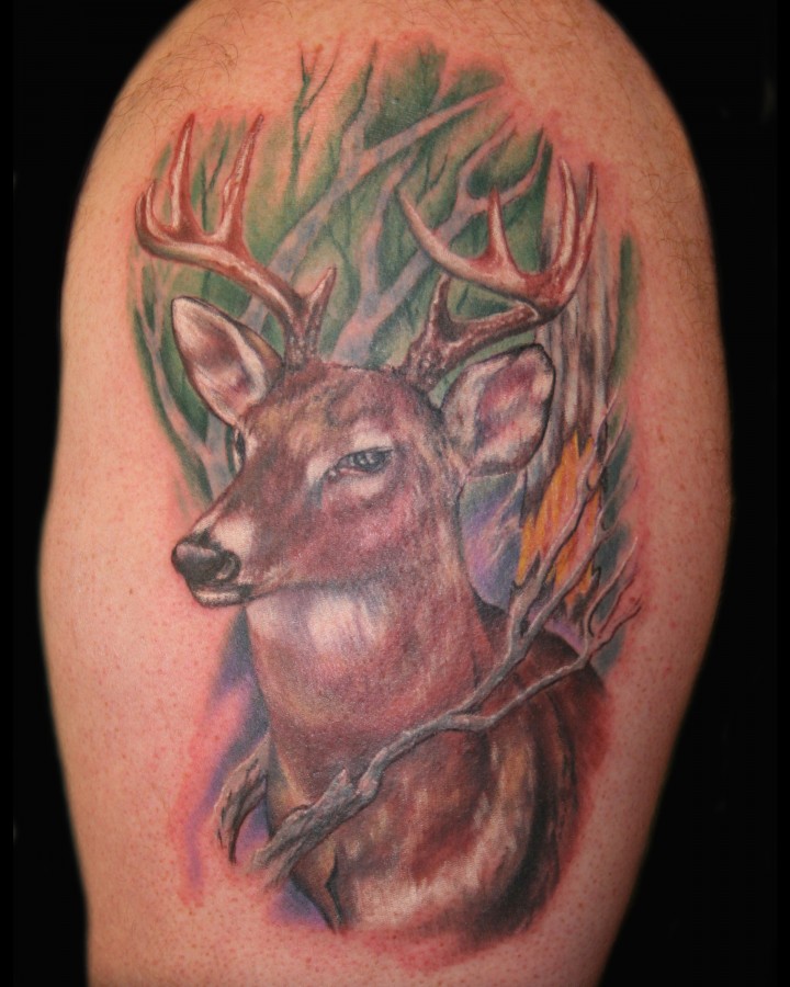 Coloured deer tattoo