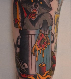 Coloured eating raccoon tattoo