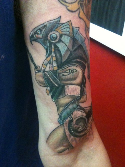 Coloured egyptian god arm tattoo