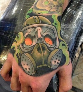 Coloured gas mask hand tattoo