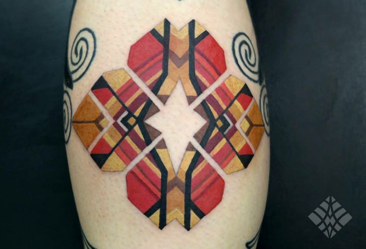 Coloured geometrical tattoo by Brian Gomes