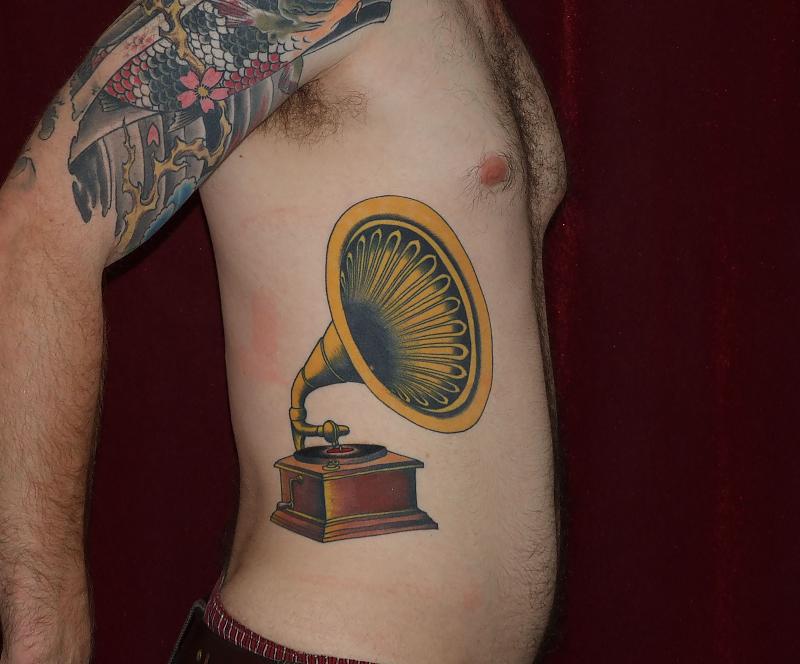 Coloured gramophone side tattoo