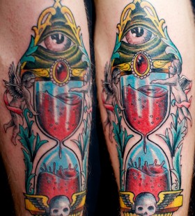 Coloured sand clock tattoo