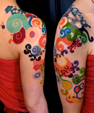 Colourful arm tattoo by Esther Garcia